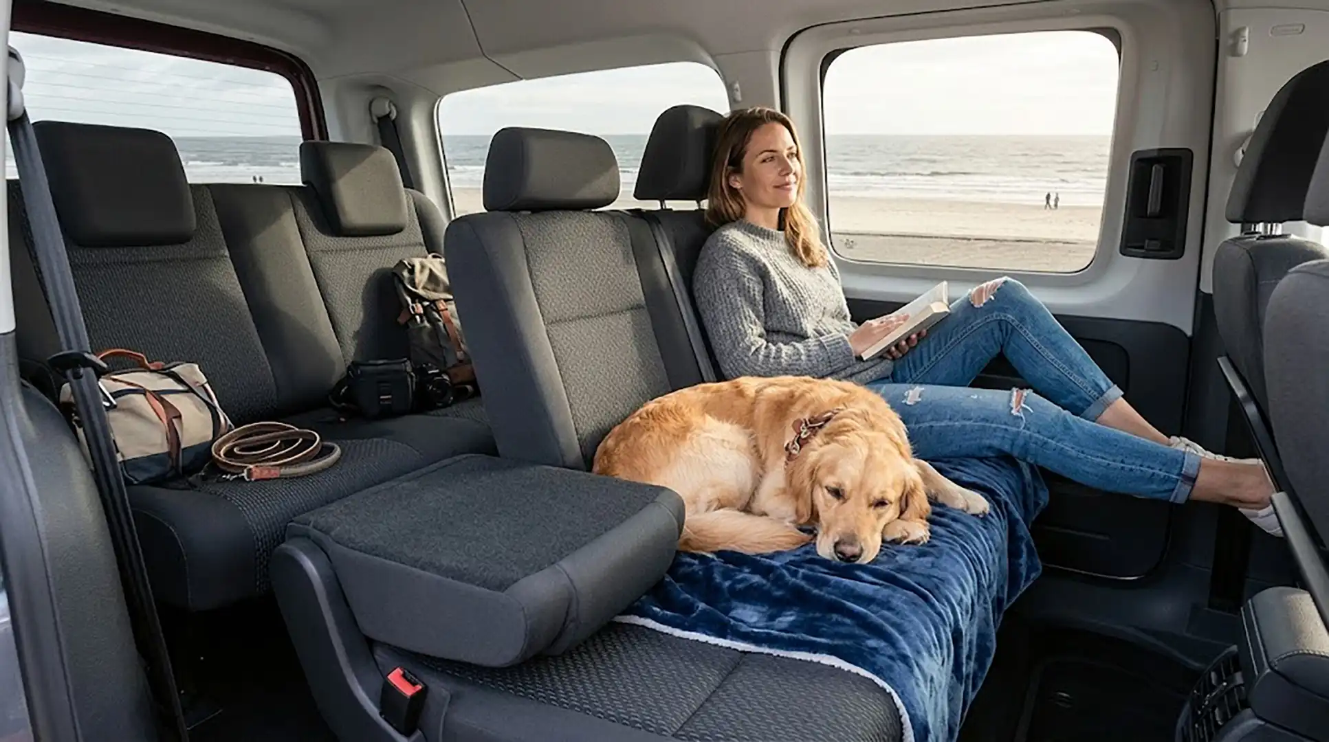 Owner and pet travelling together in the van